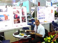 P1010862  Thomas working with Xorella on the same booth at SaigonTex