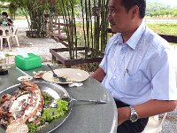 P1000226  Tan enjoys his fish!